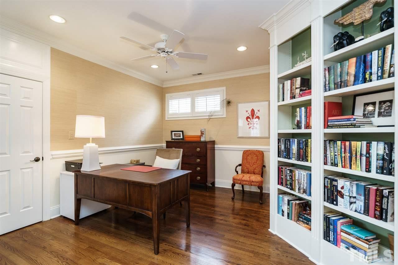 1820 Torrington Street Raleigh, NC 27615 - Photo 20 of 25 a workspace with furniture and book shelf