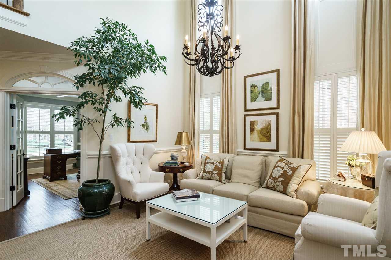 1820 Torrington Street Raleigh, NC 27615 - Photo 4 of 25 a living room with furniture and a large window