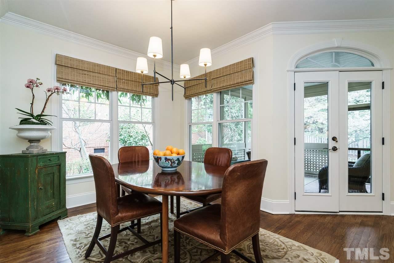 1820 Torrington Street Raleigh, NC 27615 - Photo 6 of 25 a view of a dining room with furniture window and wooden floor