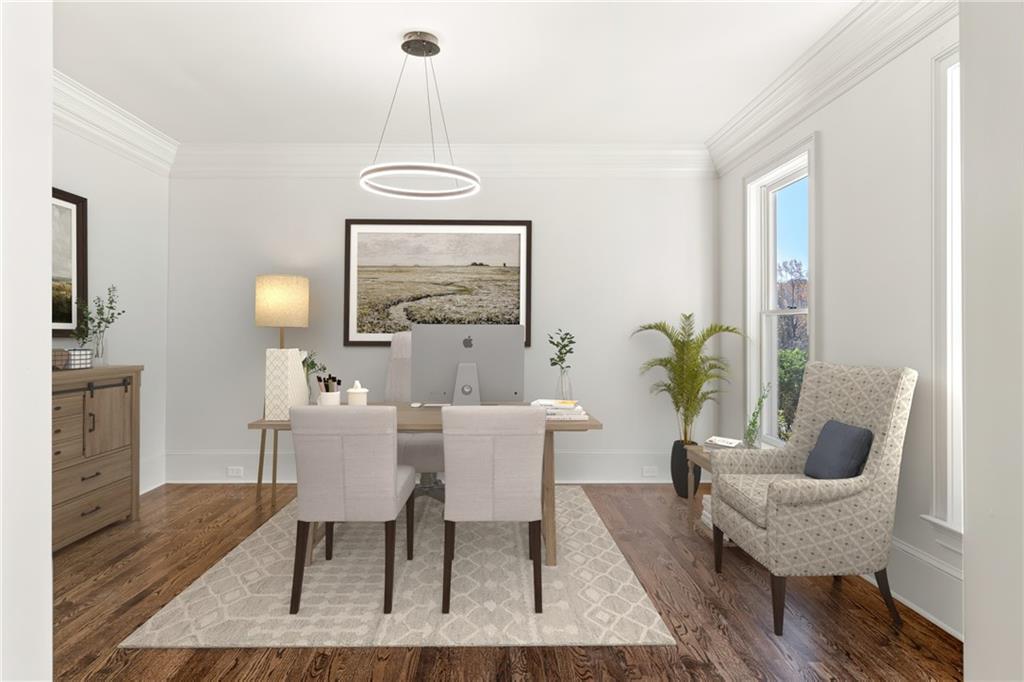 11125 Linbrook Lane Duluth, GA 30097 - Photo 11 of 51 a dining room with furniture potted plants and wooden floor