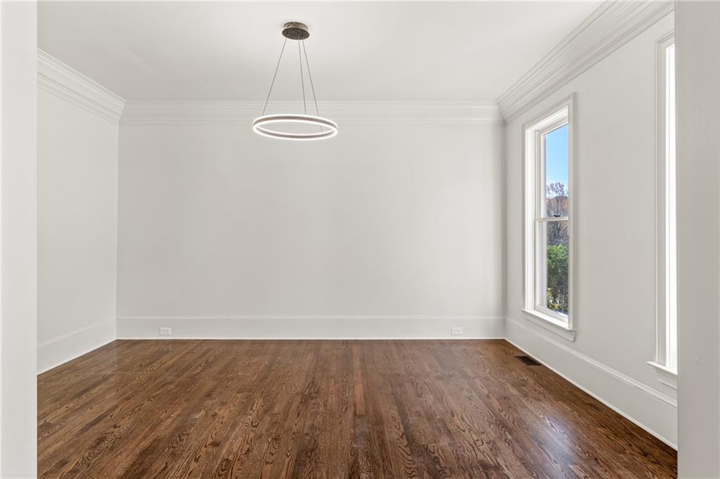 11125 Linbrook Lane Duluth, GA 30097 - Photo 12 of 51 a view of a room with wooden floor and a window