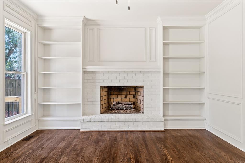 11125 Linbrook Lane Duluth, GA 30097 - Photo 15 of 51 a view of an empty room with a window and wooden floor