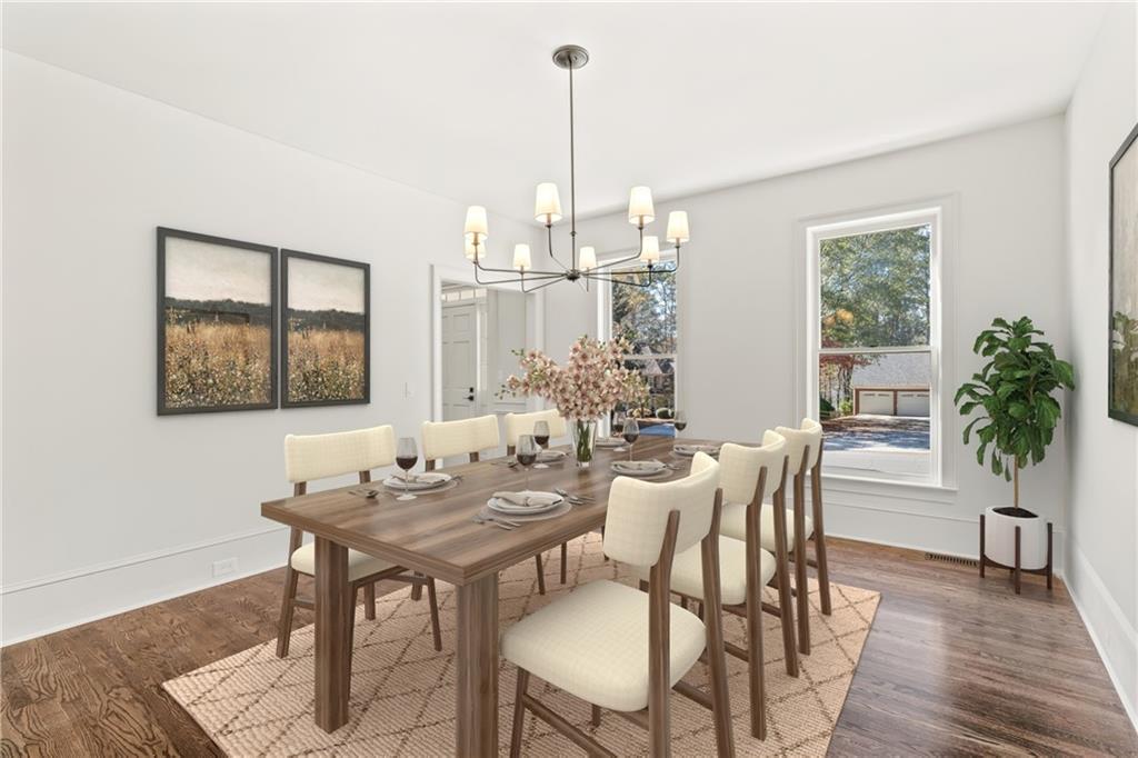 11125 Linbrook Lane Duluth, GA 30097 - Photo 17 of 51 a view of a dining room with furniture window and wooden floor