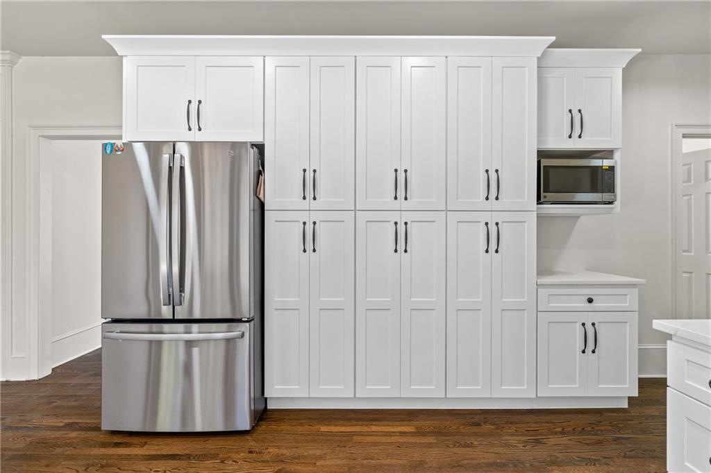 11125 Linbrook Lane Duluth, GA 30097 - Photo 23 of 51 a view of kitchen with granite countertop white cabinets and stainless steel appliances
