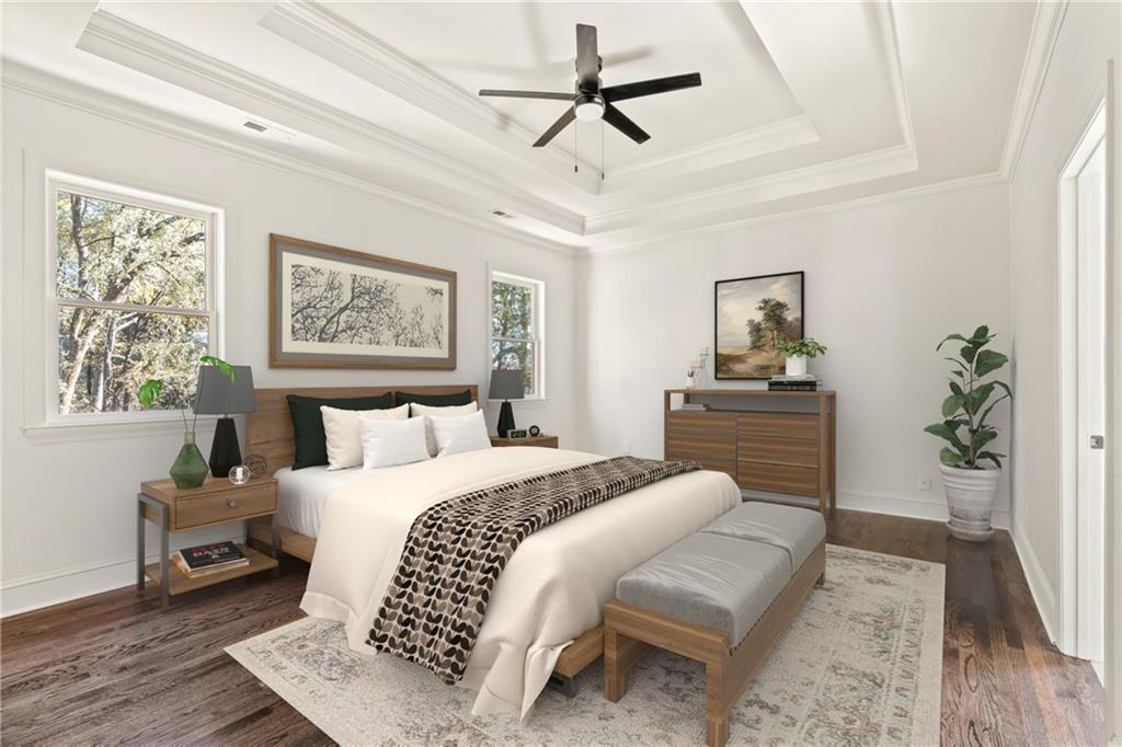 11125 Linbrook Lane Duluth, GA 30097 - Photo 30 of 51 a bedroom with a large bed and a couch