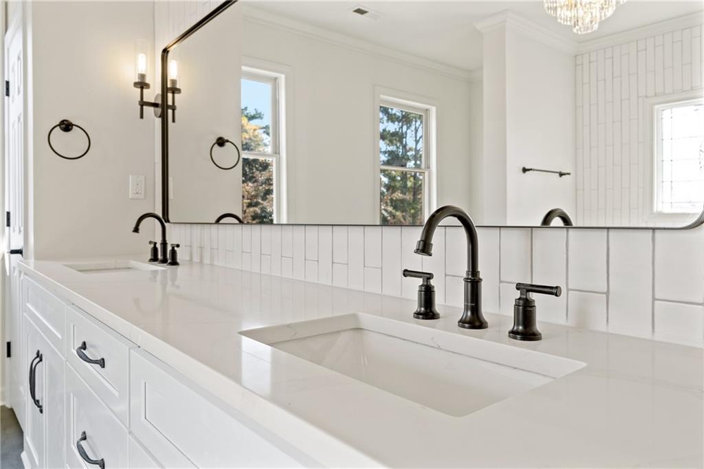 11125 Linbrook Lane Duluth, GA 30097 - Photo 37 of 51 a bathroom with a double vanity sink and a mirror