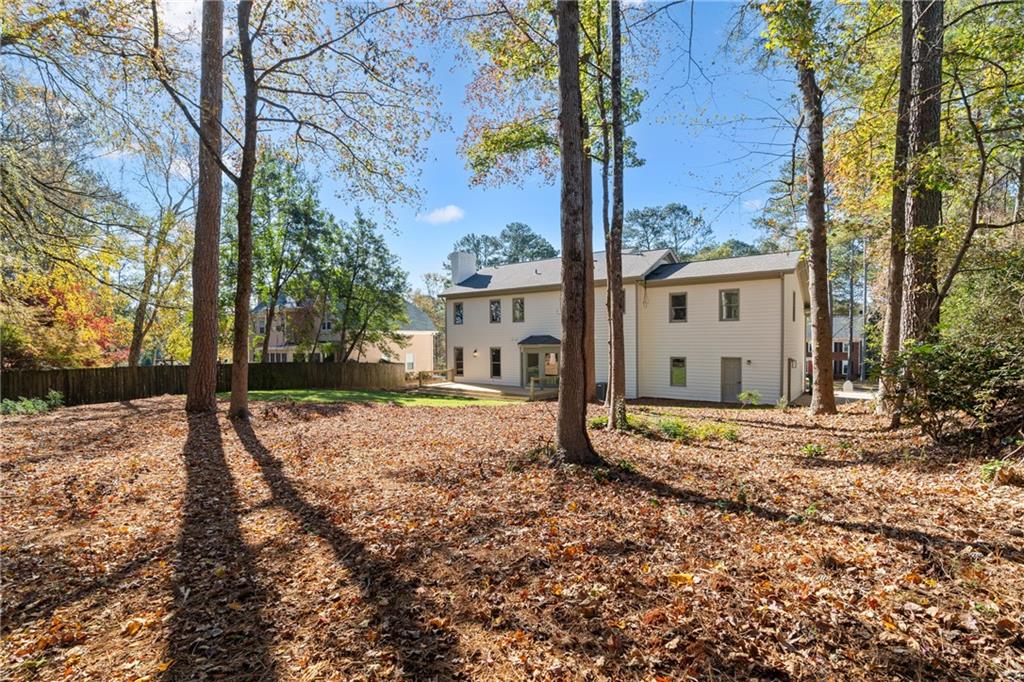 11125 Linbrook Lane Duluth, GA 30097 - Photo 50 of 51 a view of a house with a yard covered in snow