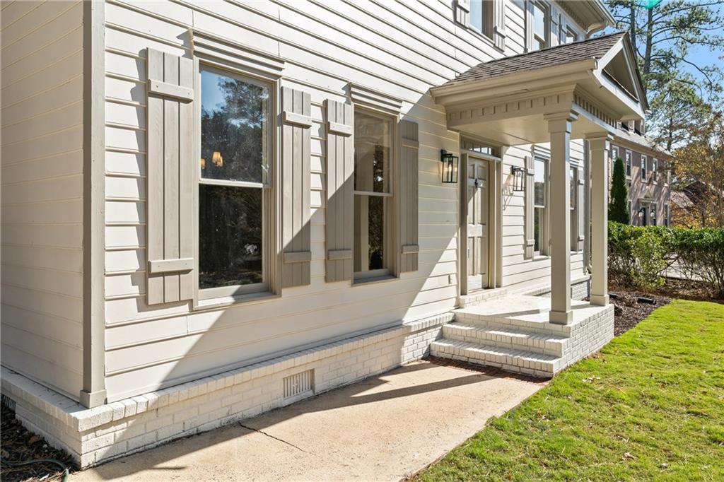 11125 Linbrook Lane Duluth, GA 30097 - Photo 6 of 51 a view of a building with a porch