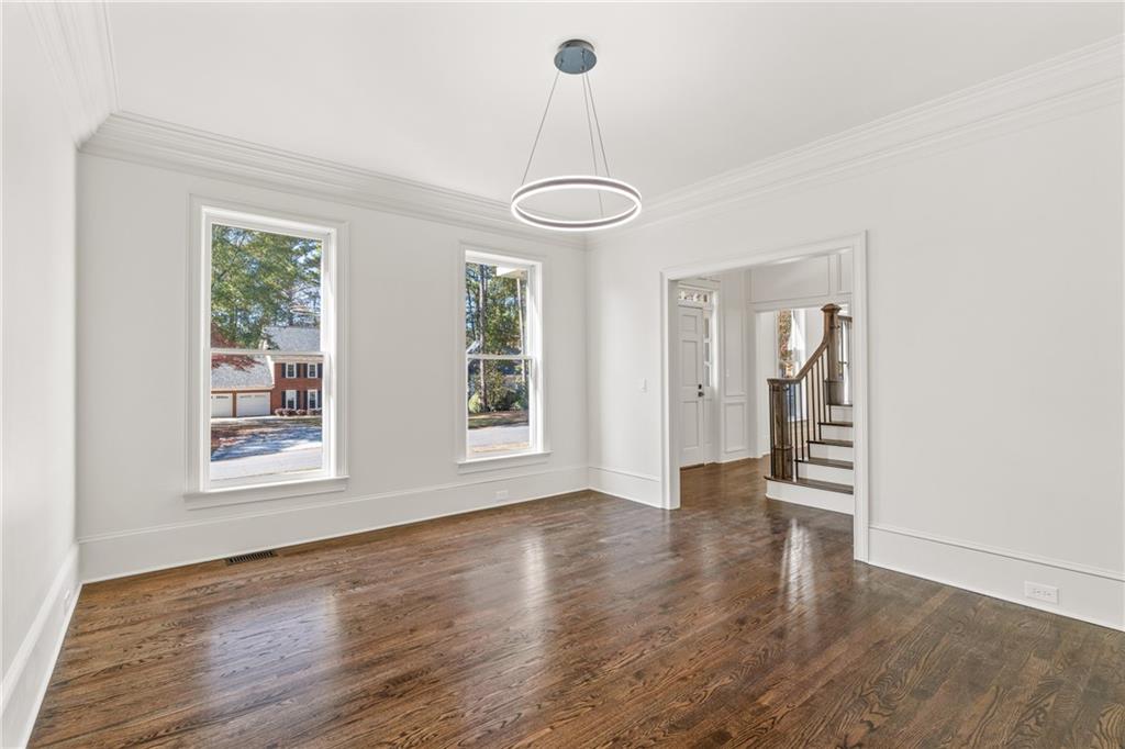 11125 Linbrook Lane Duluth, GA 30097 - Photo 10 of 51 an empty room with wooden floor and windows