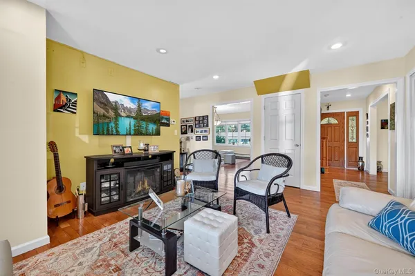 a living room with furniture and a table