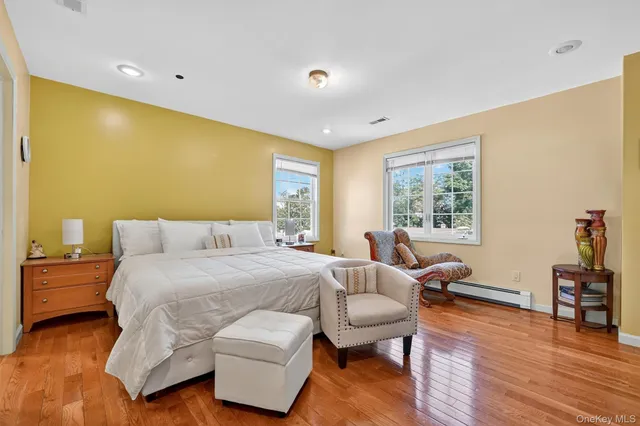 a view of livingroom with hardwood floor and a ceiling fan