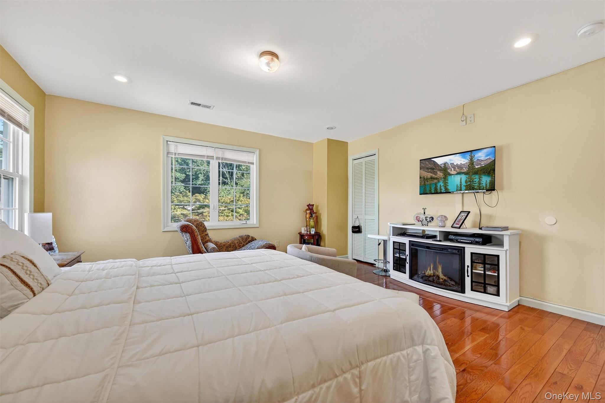 14 Malone Avenue Garnerville, NY 10923 - Photo 25 of 50 a large bedroom with a bed and wooden floor