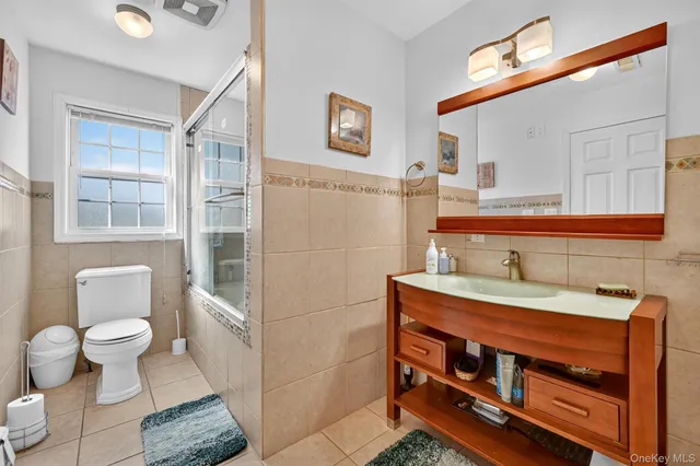 a view of a kitchen with a stove top oven