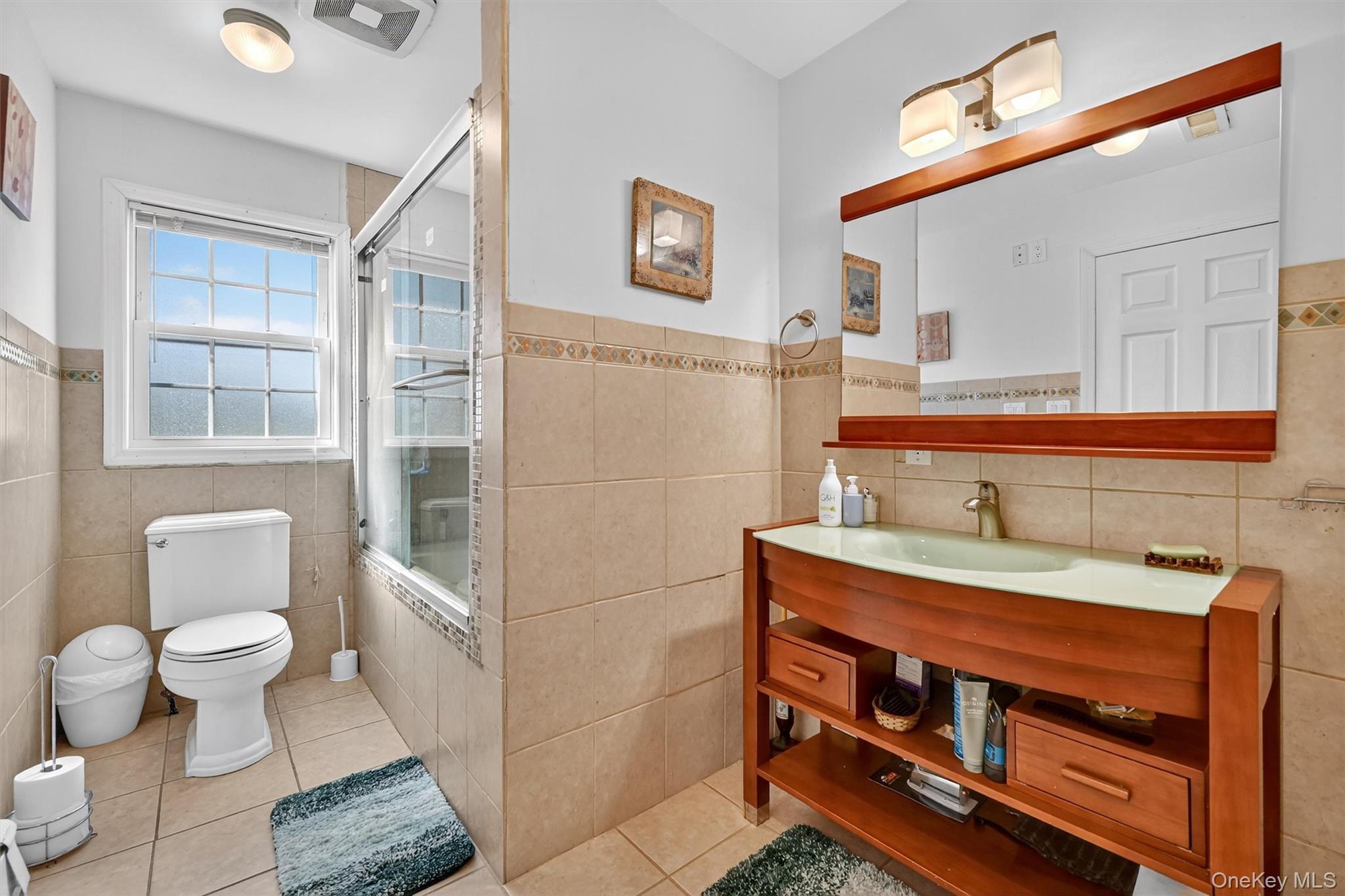 14 Malone Avenue Garnerville, NY 10923 - Photo 30 of 50 a bathroom with a sink and a toilet