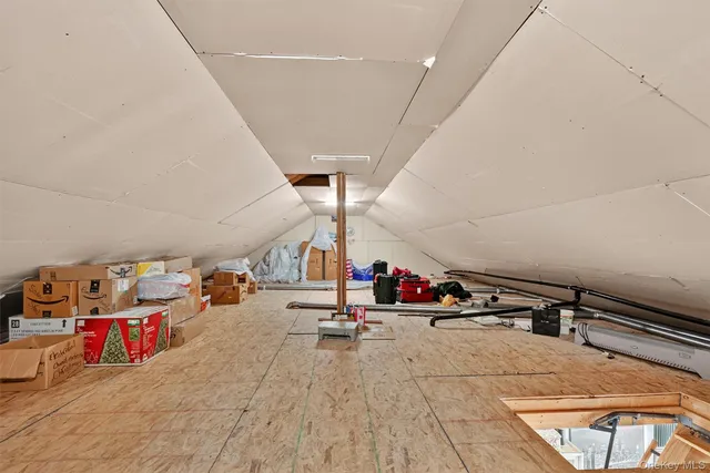 a bedroom with a bed and a closet