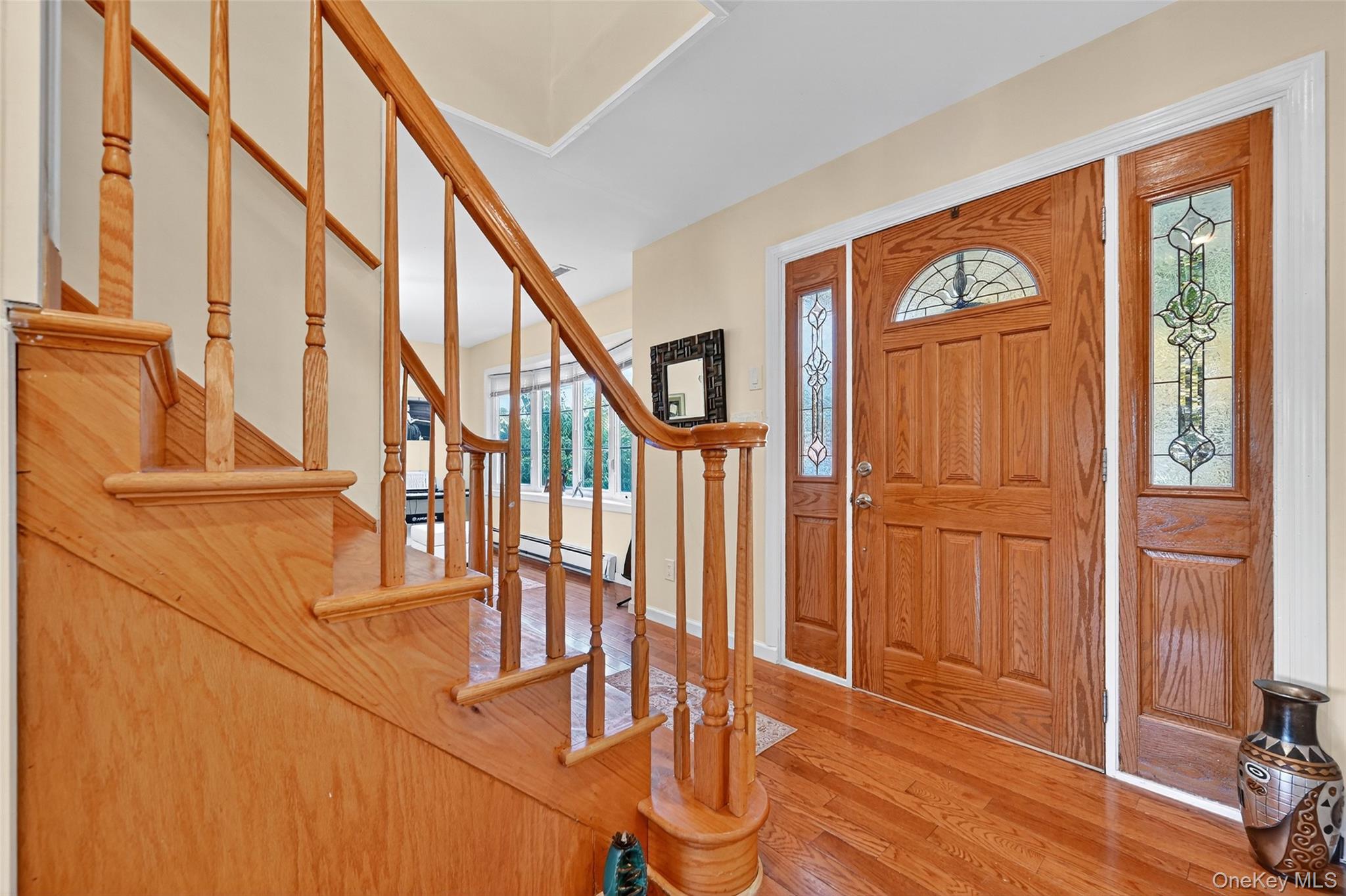 14 Malone Avenue Garnerville, NY 10923 - Photo 6 of 50 a view of an entryway with wooden floor and door