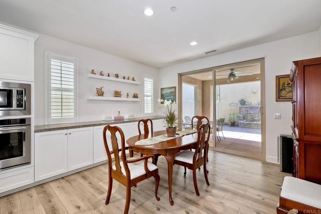 665 Gemstone Drive San Marcos, CA 92078 - Photo 12 of 49 a dining room with furniture and window