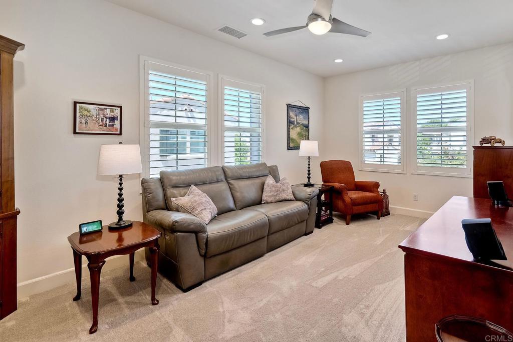 665 Gemstone Drive San Marcos, CA 92078 - Photo 14 of 49 a living room with furniture and a large window