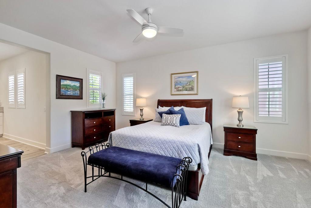 665 Gemstone Drive San Marcos, CA 92078 - Photo 15 of 49 a bedroom with a bed and a table