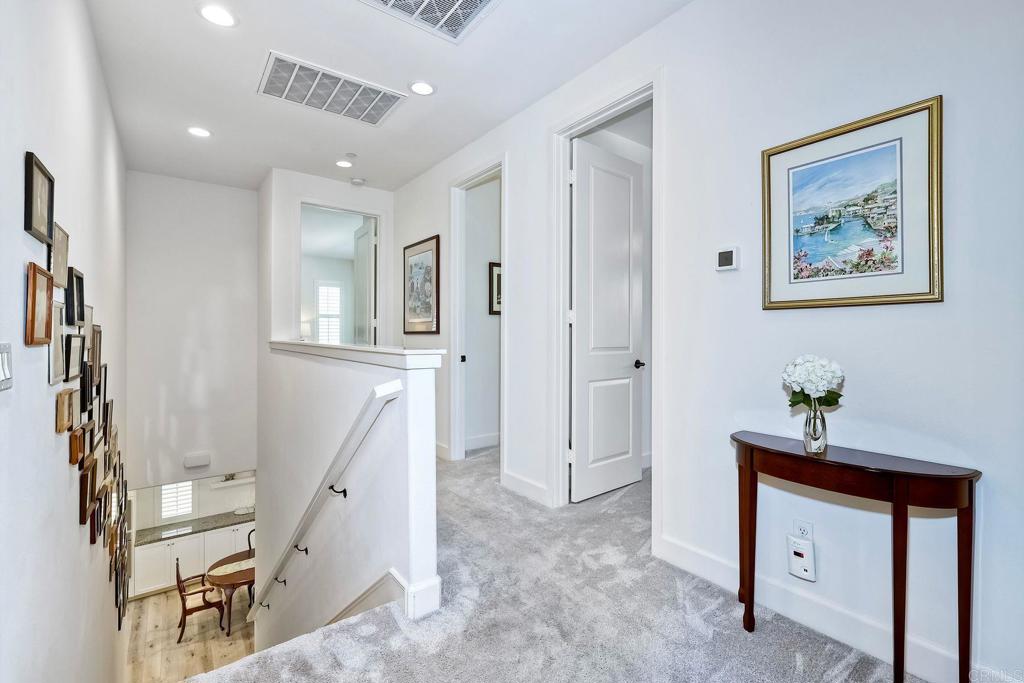665 Gemstone Drive San Marcos, CA 92078 - Photo 25 of 49 a view of hallway with furniture and windows