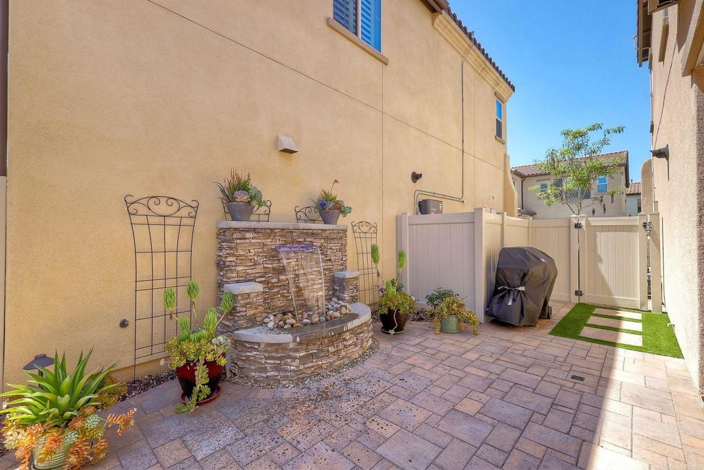 665 Gemstone Drive San Marcos, CA 92078 - Photo 32 of 49 a view of a chair and table in the patio