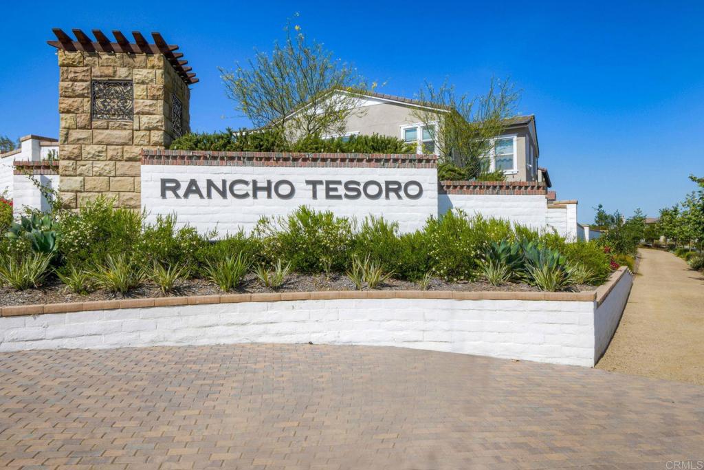 665 Gemstone Drive San Marcos, CA 92078 - Photo 49 of 49 a view of a sign board with buildings in the background