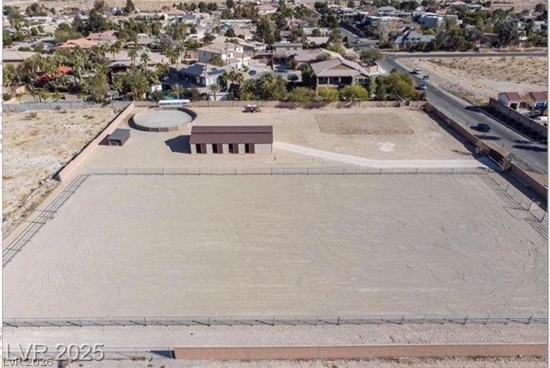 5910 West Post Road Las Vegas, NV 89118 - Photo 1 of 4 Expansive equestrian facilities, including a barn and arena, define this horse-friendly property.