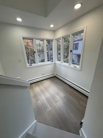 an empty room with windows