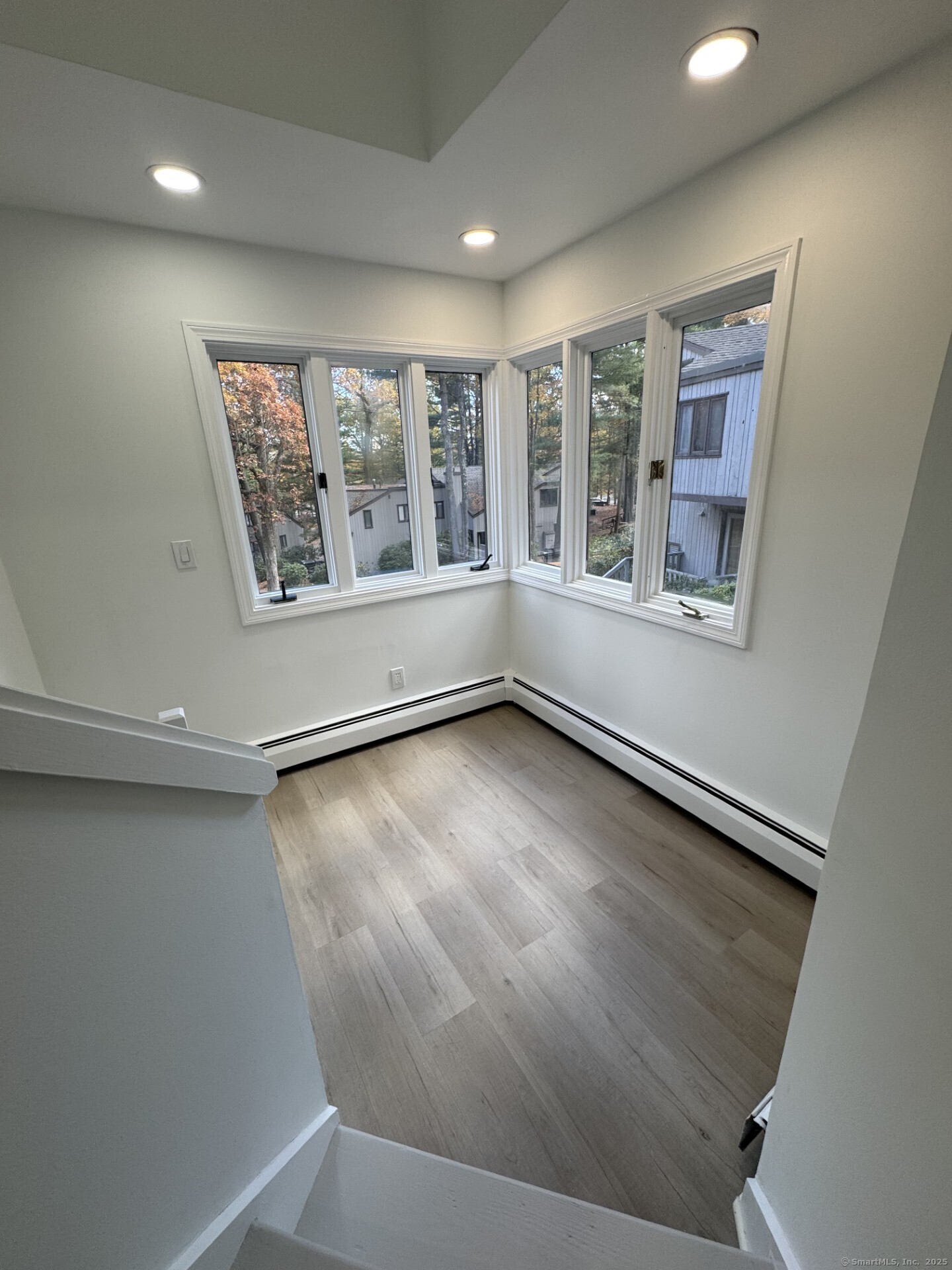 4 Earls Court, Unit C Farmington, CT 06032 - Photo 11 of 18 an empty room with windows