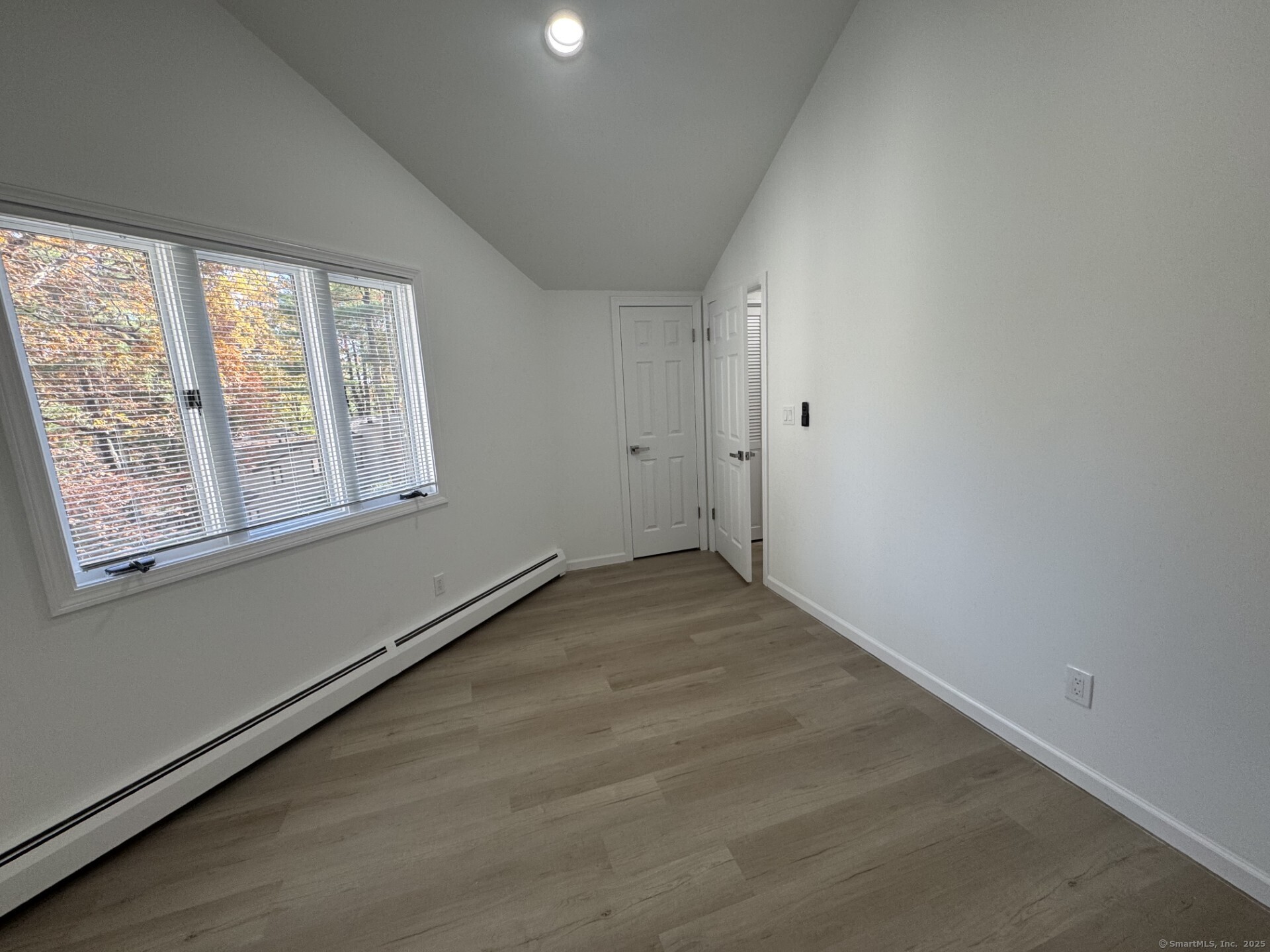 4 Earls Court, Unit C Farmington, CT 06032 - Photo 17 of 18 an empty room with a window