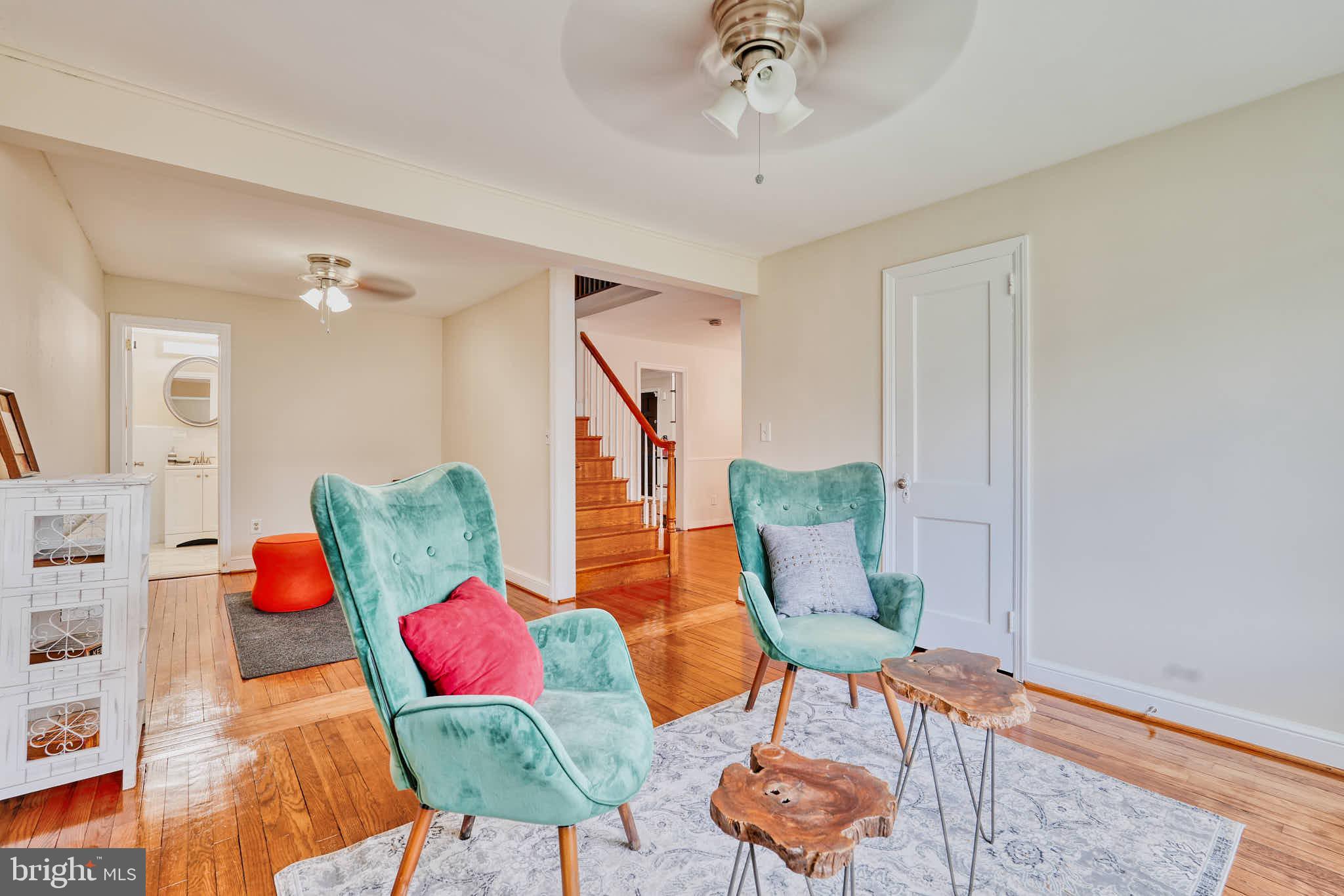 3318 Memorial Street Alexandria, VA 22306 - Photo 11 of 49 a living room with furniture kitchen view and a rug