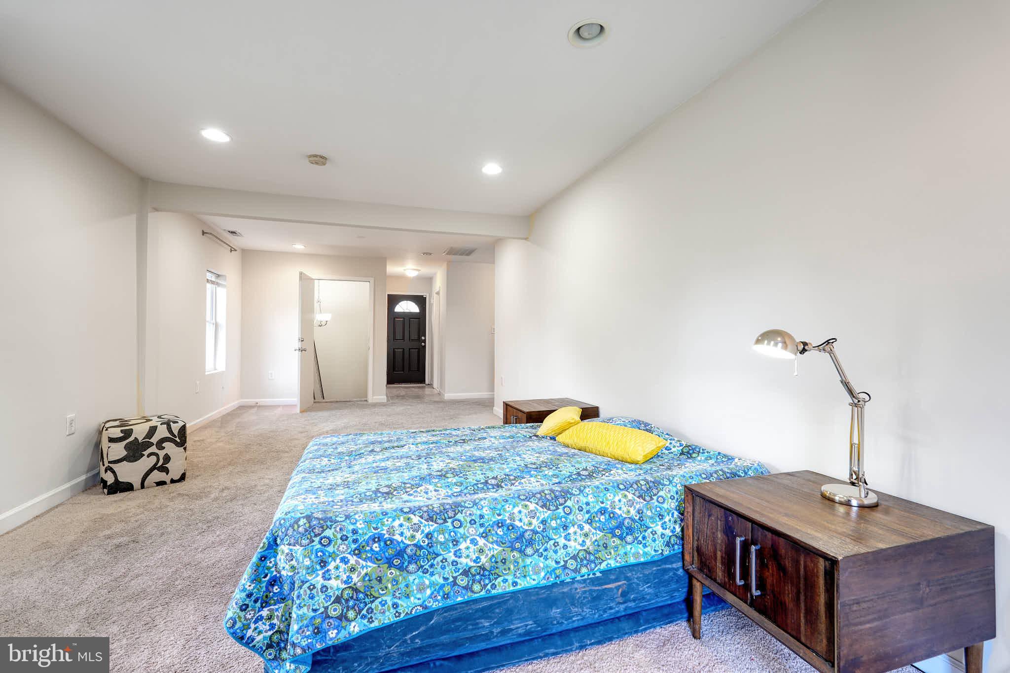 3318 Memorial Street Alexandria, VA 22306 - Photo 18 of 49 a bedroom with a bed and a dresser