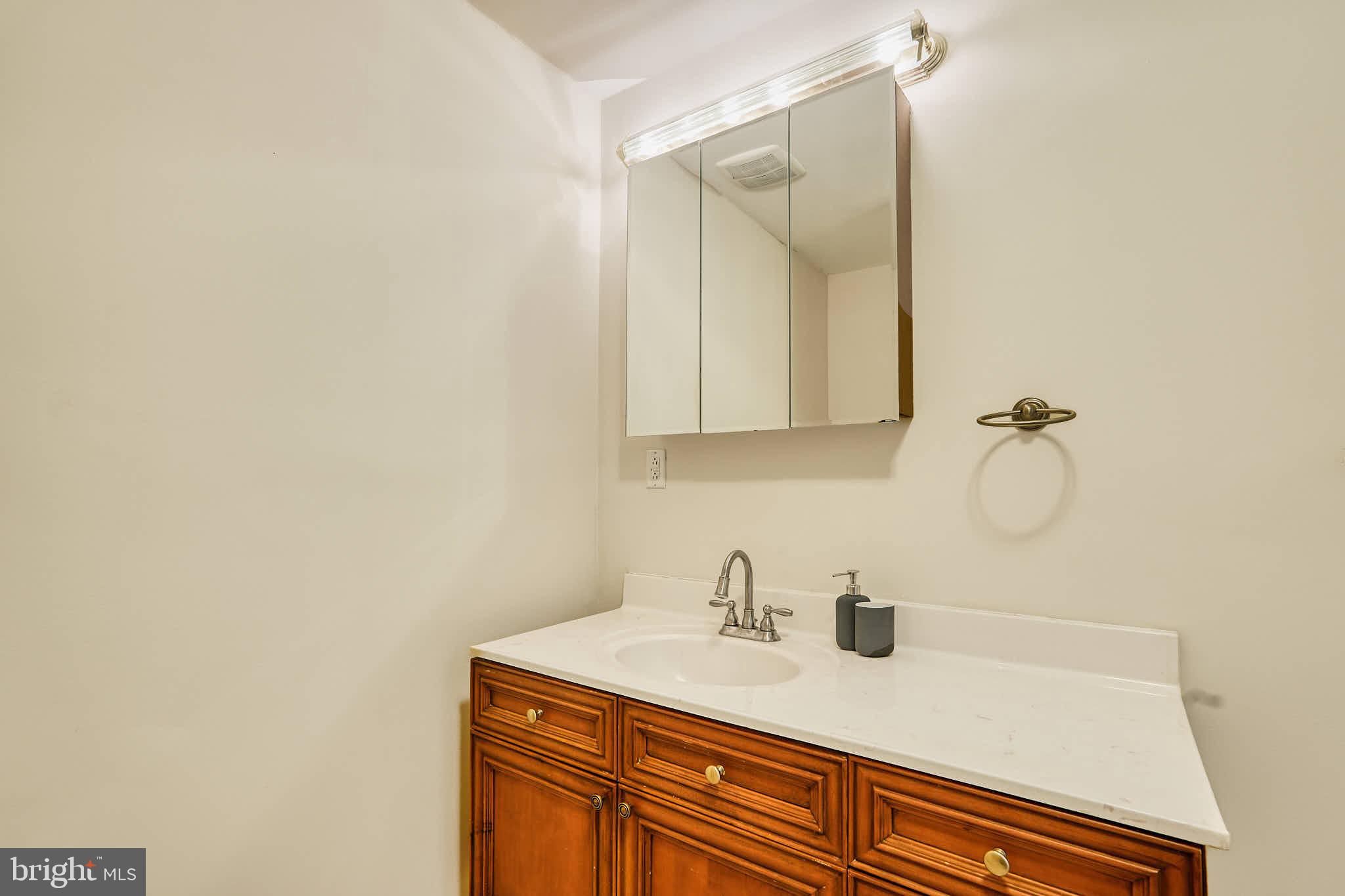 3318 Memorial Street Alexandria, VA 22306 - Photo 21 of 49 a bathroom with a sink and vanity