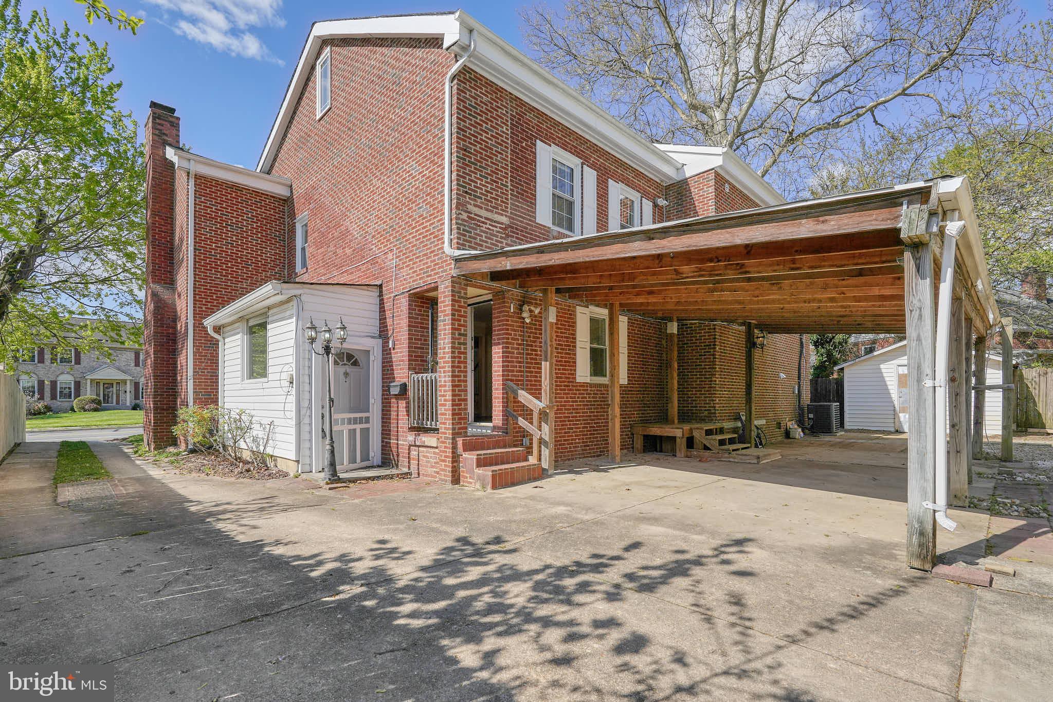 3318 Memorial Street Alexandria, VA 22306 - Photo 32 of 49 a view of a house with a patio