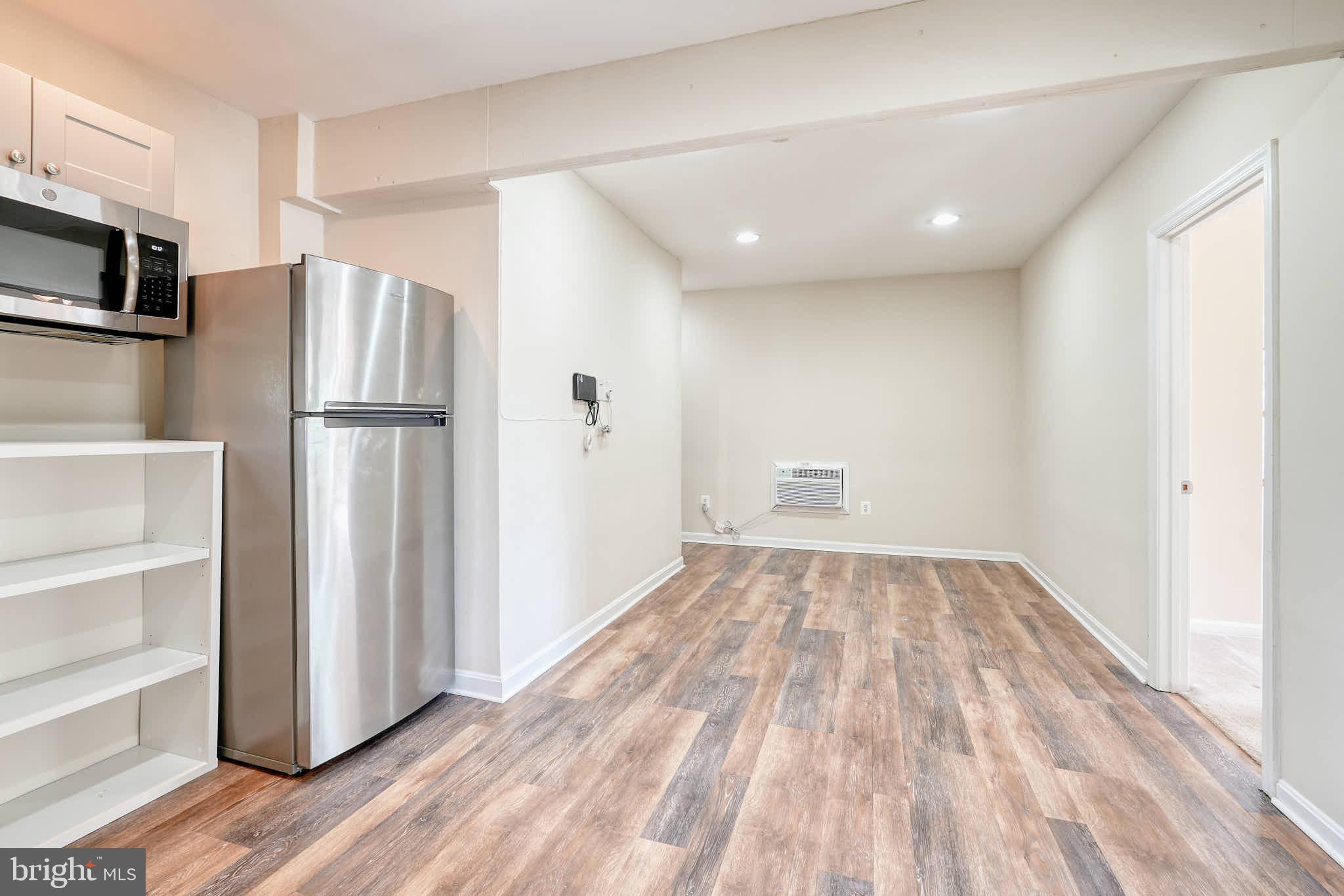 3318 Memorial Street Alexandria, VA 22306 - Photo 38 of 49 a view of kitchen with wooden floor and electronic appliances