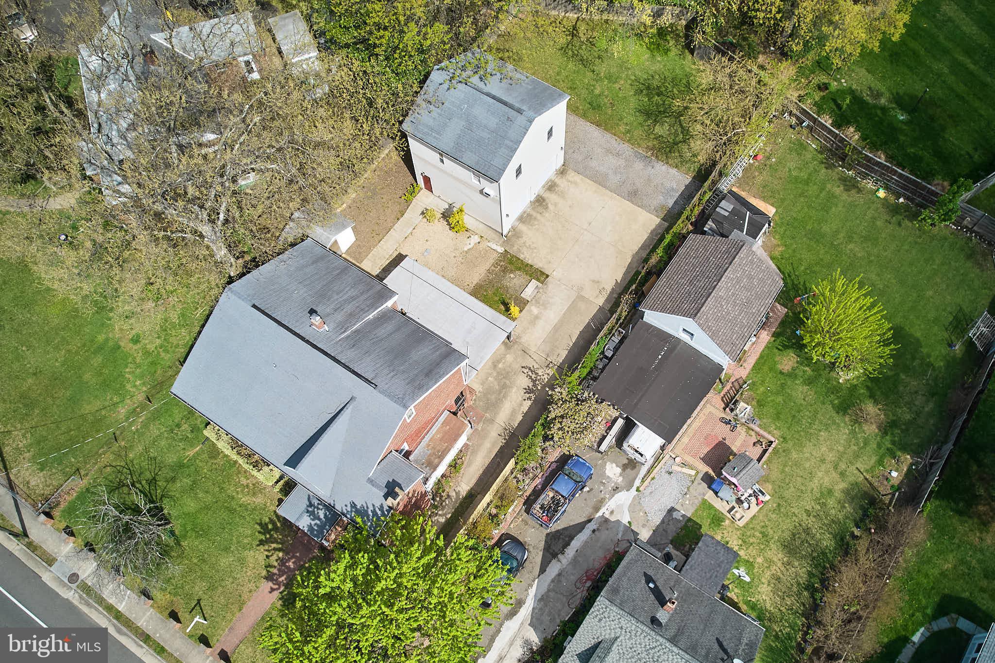 3318 Memorial Street Alexandria, VA 22306 - Photo 47 of 49 an aerial view of a house with outdoor space and street view
