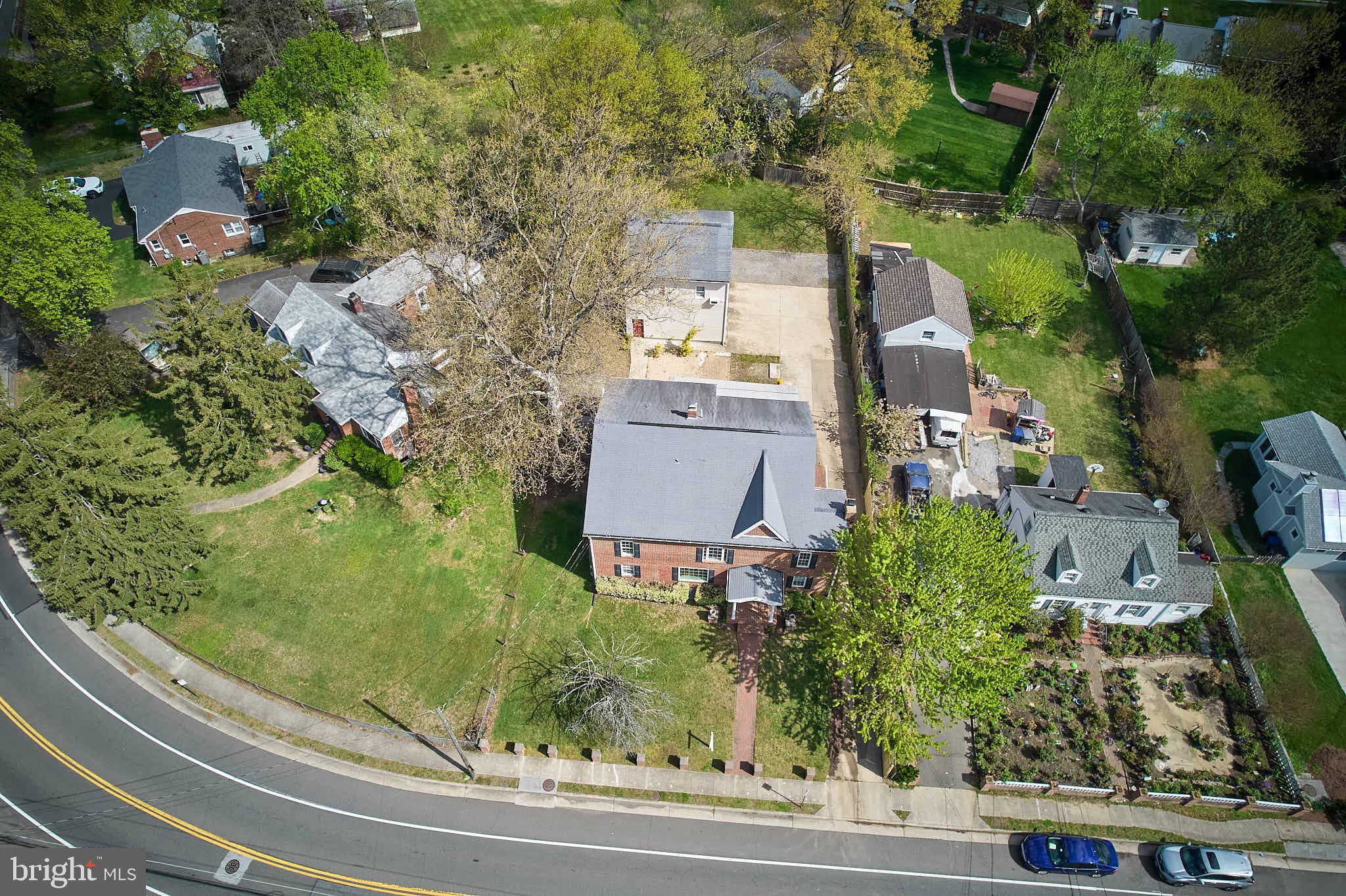 3318 Memorial Street Alexandria, VA 22306 - Photo 49 of 49 an aerial view of a house with a yard and garden