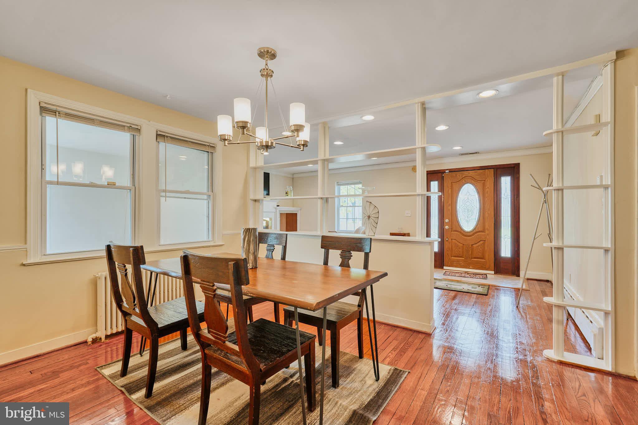 3318 Memorial Street Alexandria, VA 22306 - Photo 6 of 49 a view of a dining room with furniture wooden floor and chandelier