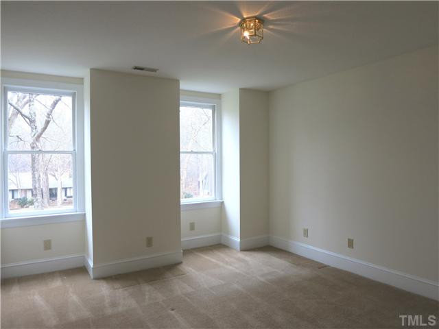 10012 Old Warden Road Raleigh, NC 27615 - Photo 17 of 25 There are 3 more very spacious Bedrooms up here w/neutral carpet & lg closets (1 has a WIC), and they share the lg divided hall Bath. This is Bedroom 2. Bedroom