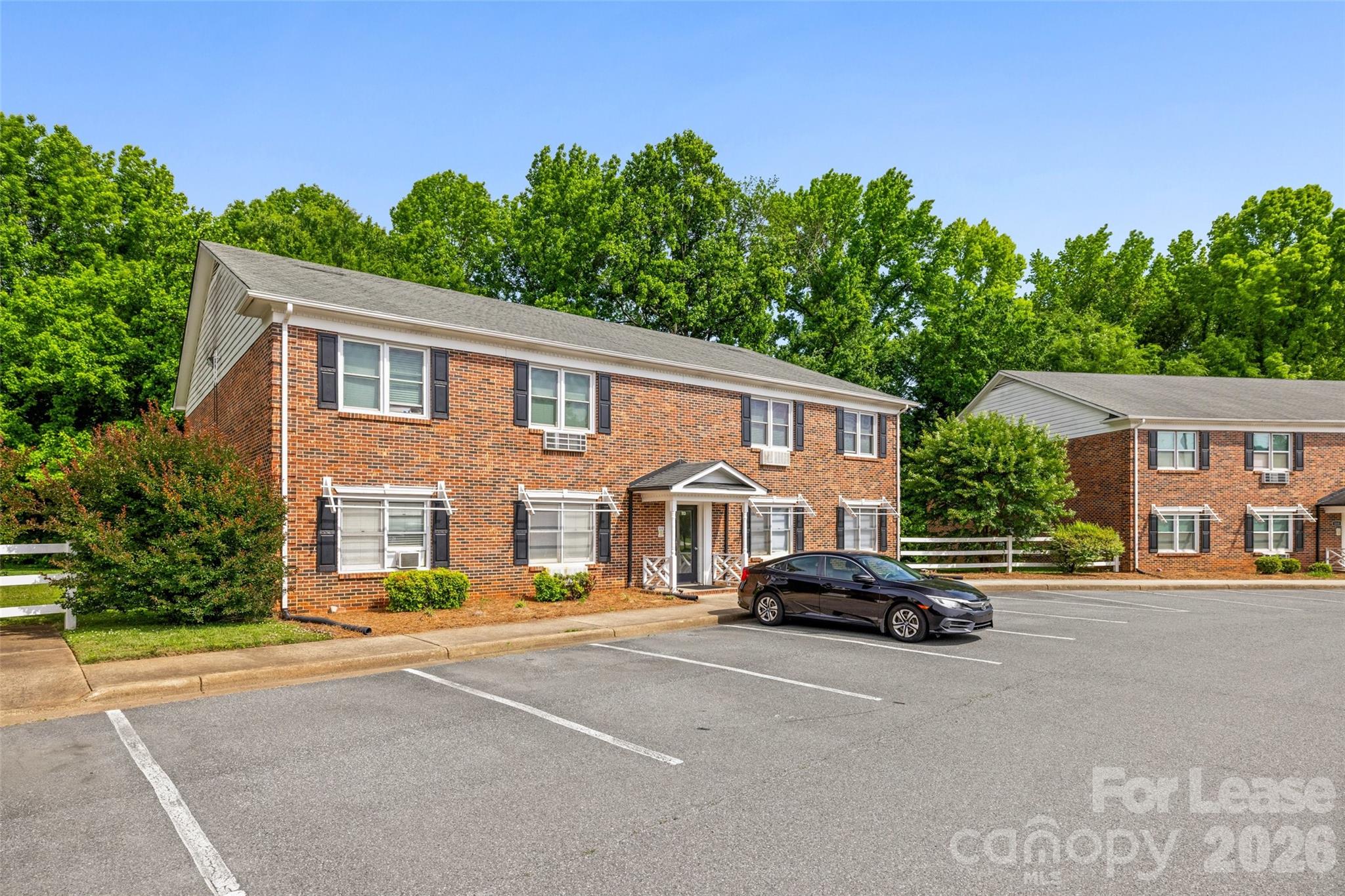 113 Stroupe Road, Unit E Gastonia, NC 28056 - Photo 24 of 32 a car parked in front of a house