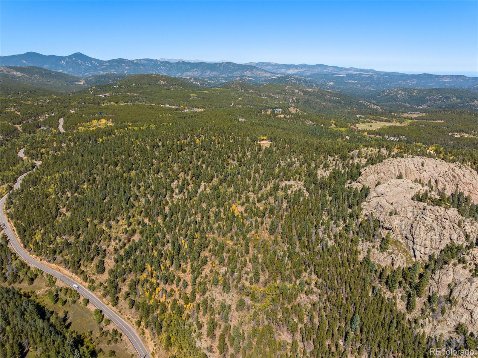 31334 Forest Shadow Trail Conifer, CO 80433 - Photo 15 of 16 a view of lake with mountain
