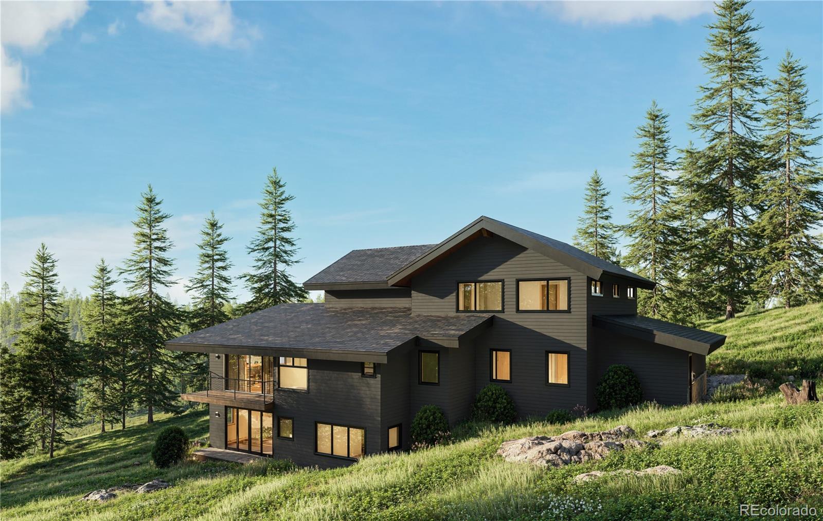 31334 Forest Shadow Trail Conifer, CO 80433 - Photo 4 of 16 a front view of a house with garden