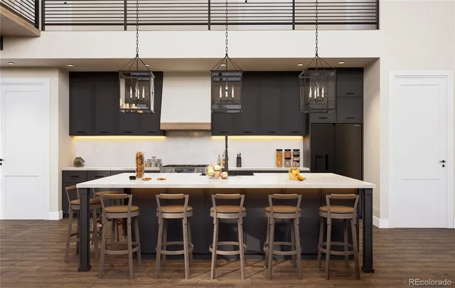 a kitchen with a table and chairs in it