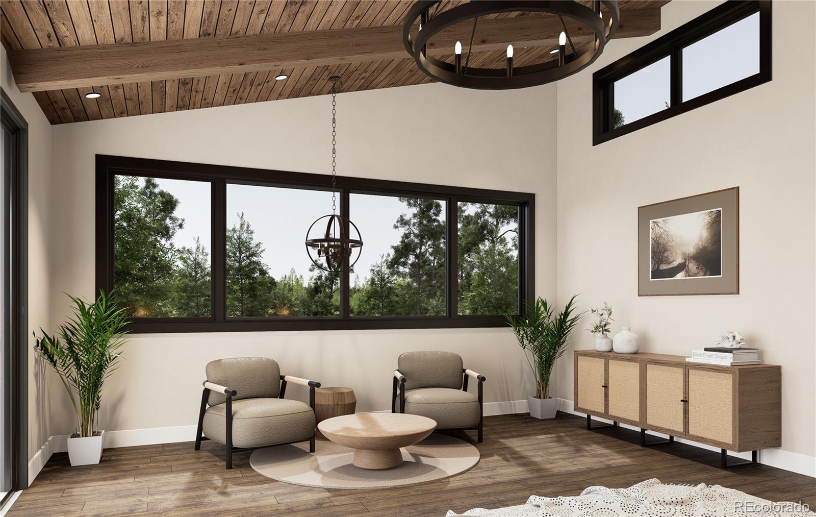 31334 Forest Shadow Trail Conifer, CO 80433 - Photo 9 of 16 a living room with furniture and a large window