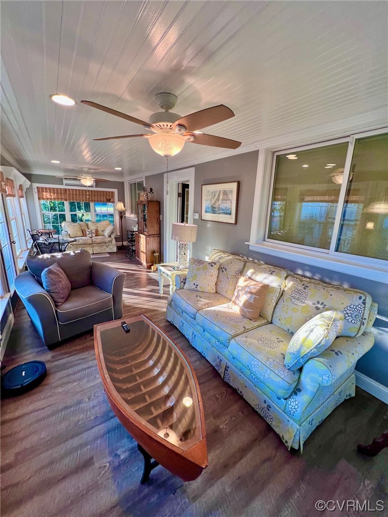 142 Circle Drive Deltaville, VA 23043 - Photo 16 of 49 a living room with furniture and a wooden floor