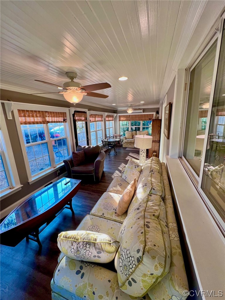 142 Circle Drive Deltaville, VA 23043 - Photo 17 of 49 a living room with furniture and a flat screen tv
