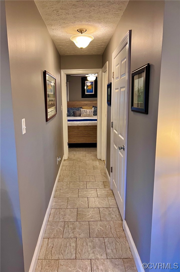 142 Circle Drive Deltaville, VA 23043 - Photo 26 of 49 a view of a hallway with a kitchen
