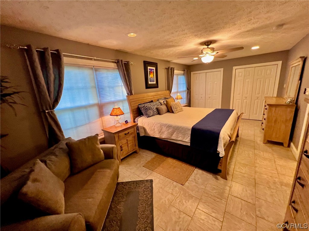 142 Circle Drive Deltaville, VA 23043 - Photo 29 of 49 a bedroom with a bed and window