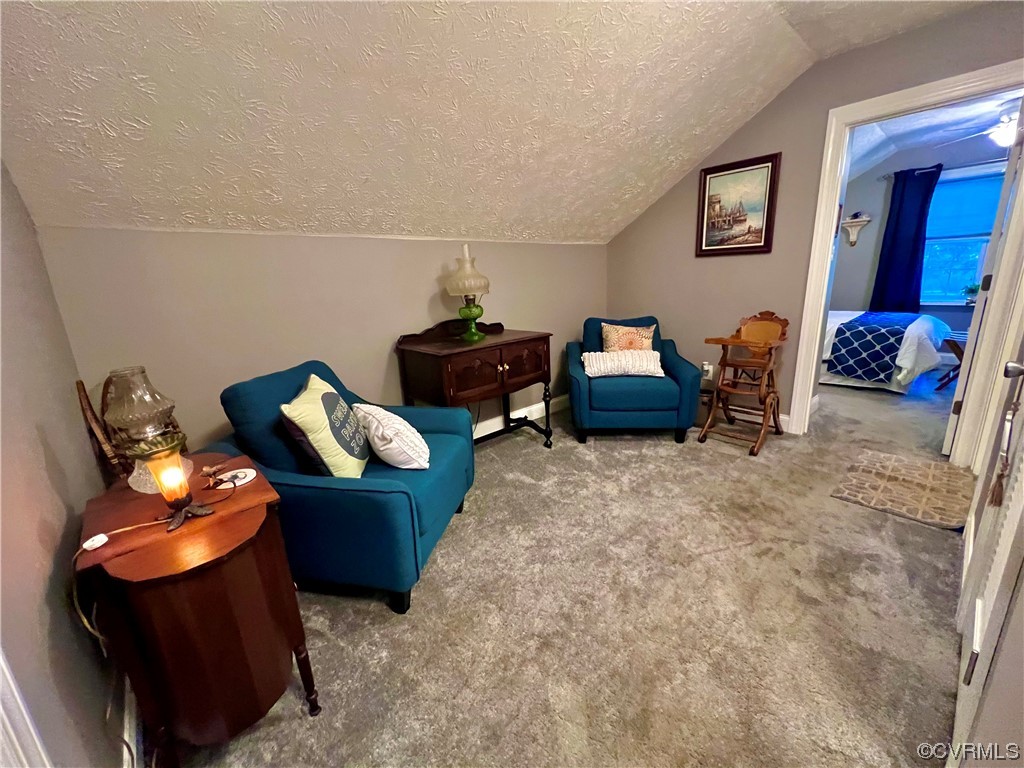 142 Circle Drive Deltaville, VA 23043 - Photo 35 of 49 a bedroom with furniture and a chair