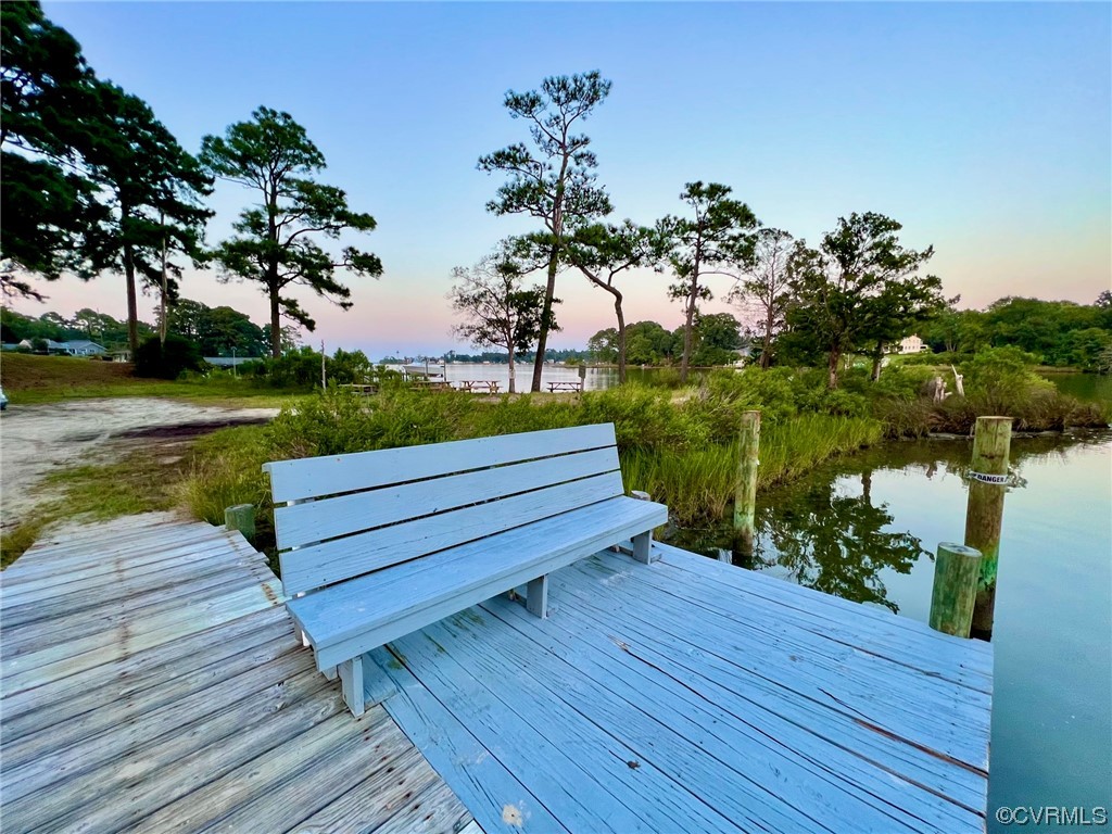 142 Circle Drive Deltaville, VA 23043 - Photo 49 of 49 a view of a wooden deck with lake view